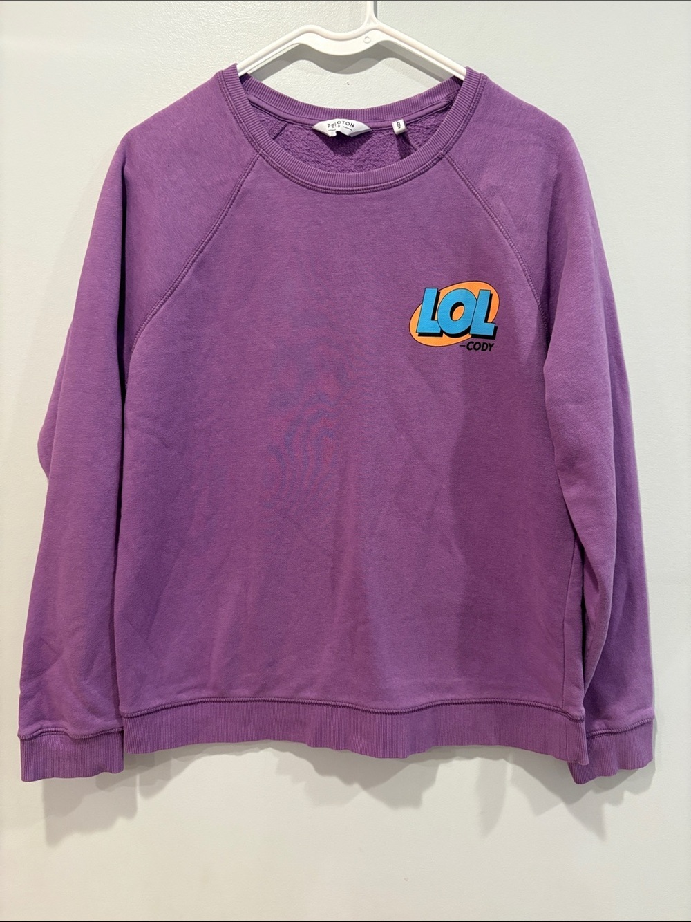 Peloton Purple Sweatshirt with LOL Graphic ptp 19 length 24.5